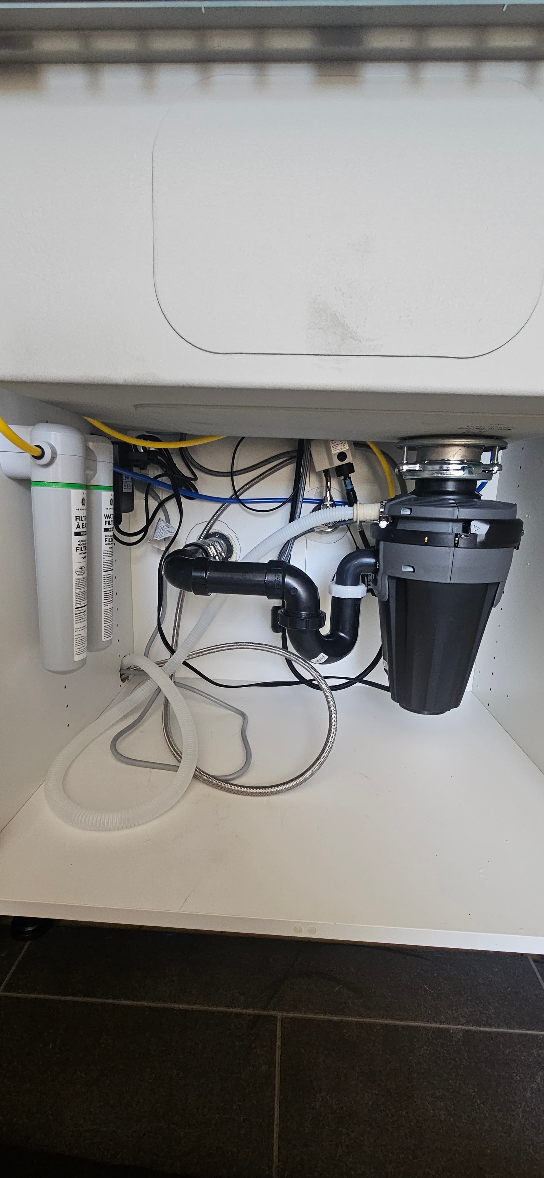 Garbage disposal and under-sink fixture work