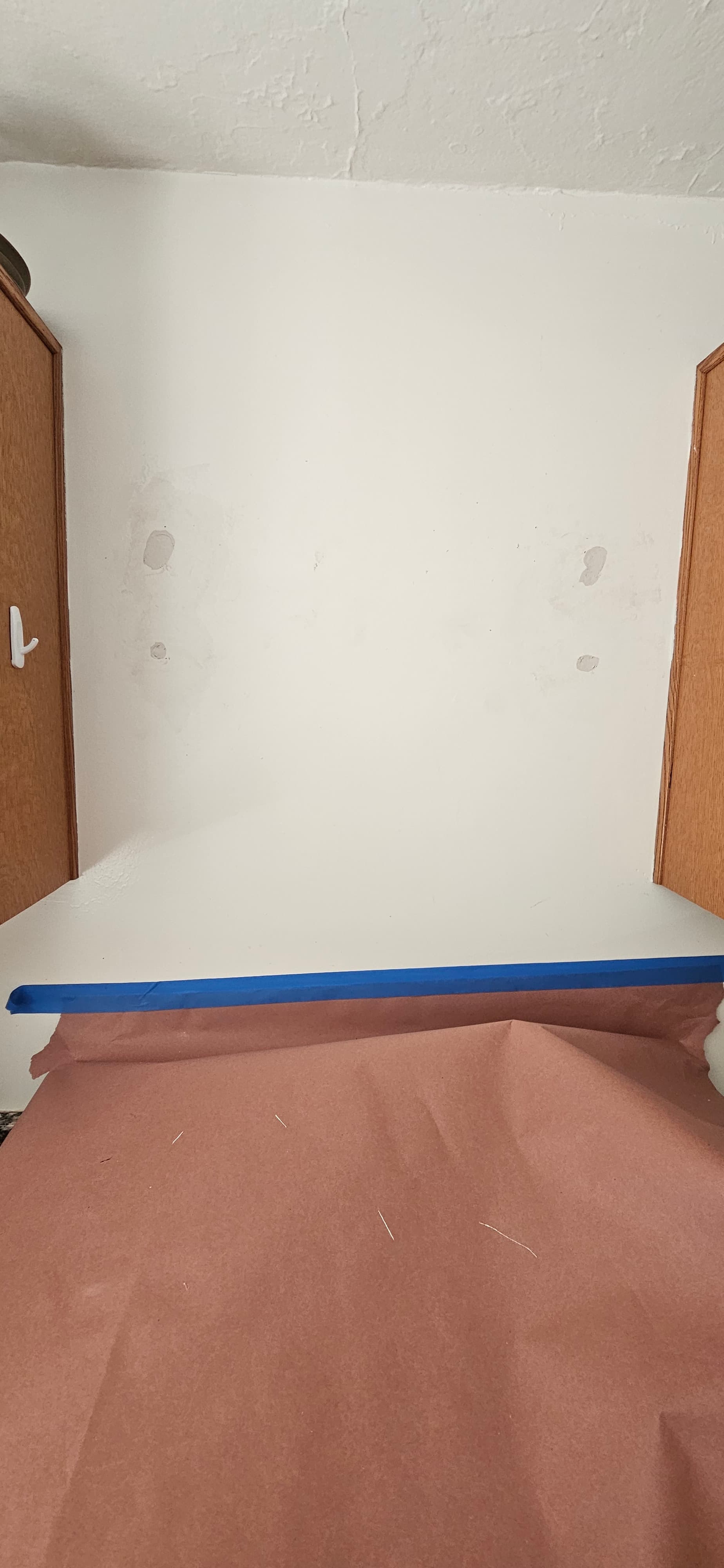 Drywall holes repaired and finished
