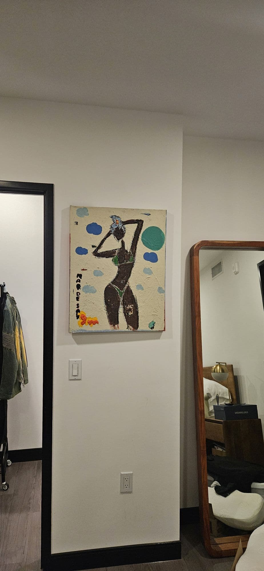 Painting hung level on living room wall