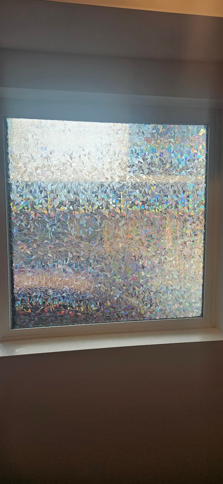 Decorative window cover after repair