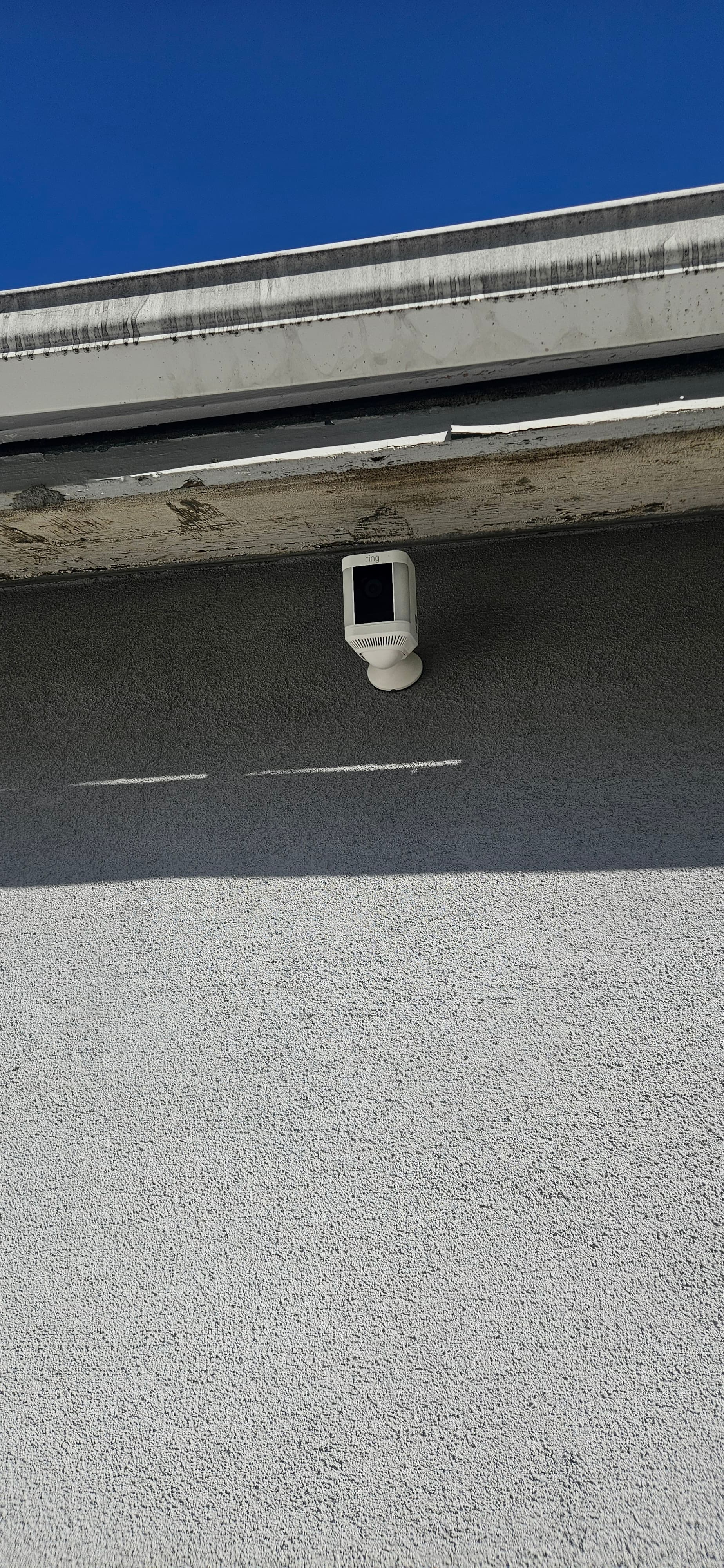 Outdoor security camera mounted outside